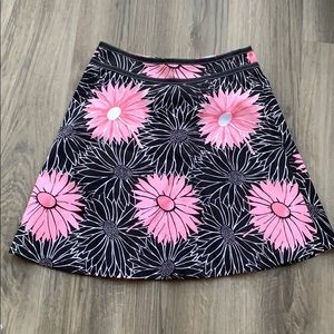 Cute, classic floral skirt with ribbon detail!